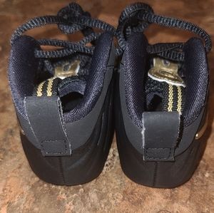 Black and gold baby foam posites